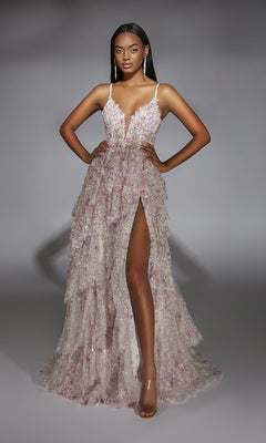 A woman poses against a gray background in the Alyce 61745 long prom dress, featuring a sleeveless corset bodice, tiered ruffles, sequin details, glitter tulle fabric, a deep neckline, and high slit.