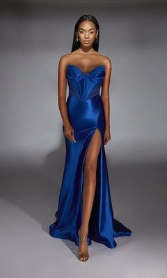 A woman wears the Long Prom Dress: Alyce 61754—a royal blue strapless satin gown with a sweetheart neckline, structured bodice, high front slit, and floor-length hem.