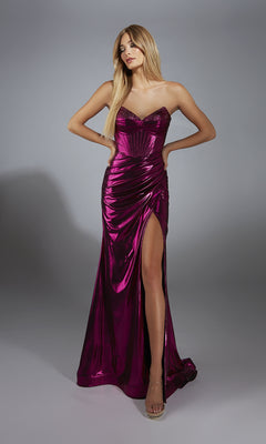 A woman models the Strapless Metallic Long Prom Dress: Alyce 61798, which features a thigh-high slit, standing against a plain gray background.