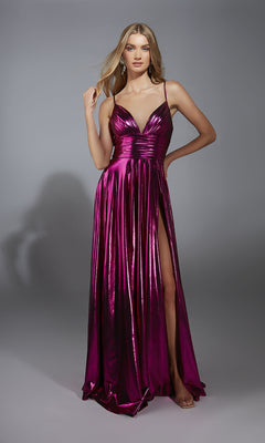 A woman poses against a plain gray background wearing the Alyce 61801 Long Metallic A-Line Prom Dress in magenta, featuring spaghetti straps, a deep V-neckline, and a high slit.