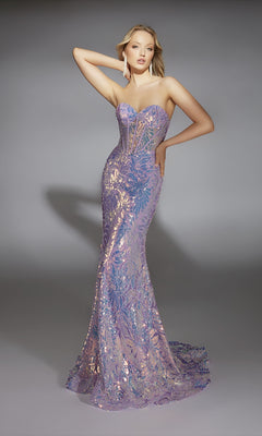 A woman poses in the Alyce 61862 long prom dress, a strapless lilac gown with a fitted bodice and flared hem adorned with sparkling sequins, set against a plain gray background.