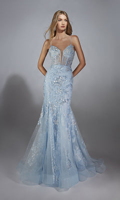 A woman models the Alyce 61867 long prom dress featuring light blue floral embroidery, a sheer corset bodice, thin straps, and a flared tulle mermaid skirt against a plain gray background.