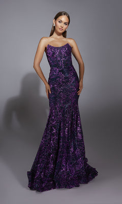 A woman poses in the Alyce 61887 long prom dress, a strapless, floor-length purple sequin mermaid gown with shimmering embellishments, beautifully standing out against a plain gray background.