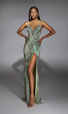A woman models the Alyce 61919 long prom dress, featuring a form-fitting silhouette, geometric patterns, a deep V-neckline, high front slit, and sparkling sequins, standing with hands on hips against a plain background.