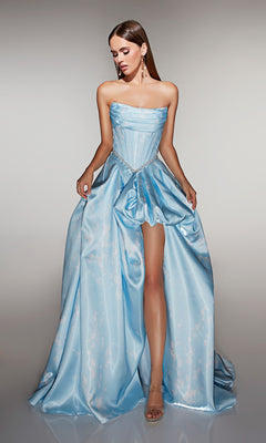 A woman stands against a neutral background wearing the Alyce 61989 Long Prom Dress, a light blue strapless satin ball gown with a corset bodice and high-leg slit.