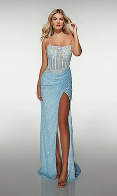 A woman wears the Alyce 62047 long prom dress in powder blue, featuring a strapless design, sequin wrap-style skirt, and semi-sheer bodice with floral appliques, standing against a plain background.