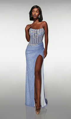 A woman models the Alyce 62047 long prom dress with a strapless bodice, floral appliques, sequin wrap-style skirt, and thigh-high slit, standing against a plain light background.