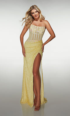 A woman wears the Alyce 62047 long prom dress in light yellow, featuring a strapless design with a sheer floral corset bodice, delicate floral appliques, and a thigh-high slit, posed against a plain light background.