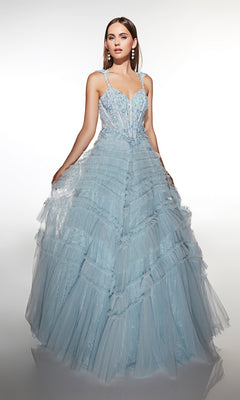 A woman poses against a white background in the Alyce 62058 long formal dress—a light blue ball gown featuring a lace bodice, ruffle accents, and elegant earrings.