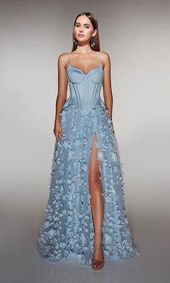A woman poses against a neutral background wearing the Alyce 62072—a light blue, strapless long formal dress with 3D floral-lace appliques, corset bodice, and high slit.
