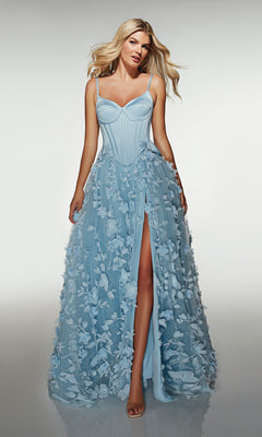 A woman wears the Alyce 62072 long formal dress in powder blue, featuring a corset bodice, 3D floral-lace appliqués on the skirt, and a high front slit.