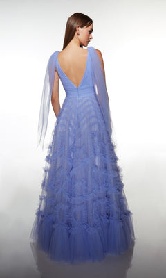 A woman models the Alyce 62079 long prom dress, a lavender tulle gown featuring a floor-length, sleeveless design with a deep V back and layered detailing, posed against a plain white background.