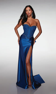 A woman poses against a plain background in the Alyce 62089 long prom dress, a royal blue strapless gown with a fitted lace corset bodice, beaded details, and a high-leg slit.