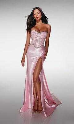 A woman models the Alyce 62089 long prom dress in Rosewater, featuring a strapless lace corset bodice with jeweled accents and a high-leg slit, set against a simple light background.