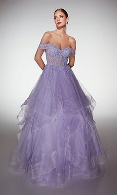 Woman wearing the lilac Alyce 62207 long formal dress, a floor-length, off-the-shoulder tulle ball gown with a sheer bodice, floral lace appliques, and a layered tulle skirt, standing against a plain background.