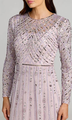 Wearing the Long Formal Dress: Mac Duggal 6236, this woman exudes sophistication in a long-sleeved, light purple sequin-embellished gown adorned with intricate geometric bead detailing—making it a perfect choice for a mother of the bride.