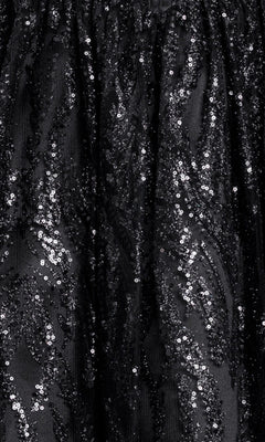 Close-up of black fabric from the Mini Black Beaded Hoco Dress: Blondie Nites 6306BN, featuring shiny sequins in swirling patterns.