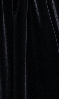 Close-up of black velvet fabric with a soft, shiny texture and vertical folds—ideal for the Strapless Black Hoco Dress: Blondie Nites 6417BN, a chic short party dress in junior sizes.