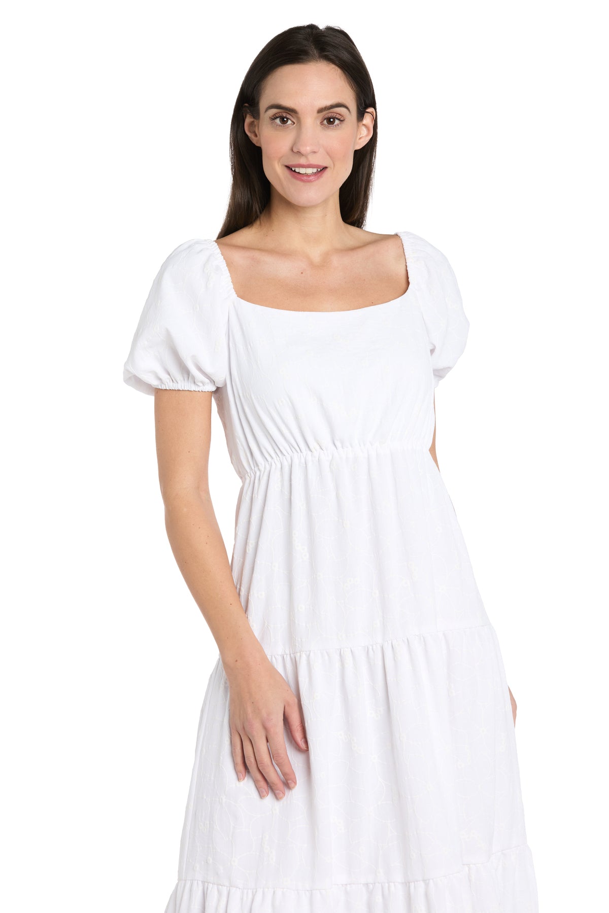 A person wearing the R&M Richards 6669 Tea-Length White Party Dress with short sleeves and a square neck stands facing forward against a plain white background.
