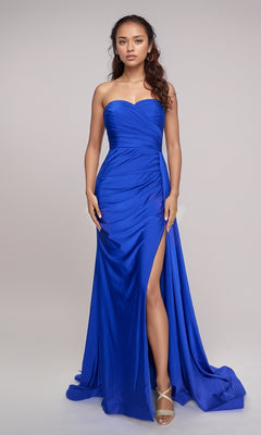 A woman models the Nina Canacci 6686, a royal blue strapless long formal dress with a sweetheart neckline and thigh-high slit, standing against a plain light background.
