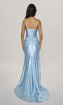 A woman wears the Nina Canacci 6687, a light blue, floor-length formal dress with thin straps, sequin details, and a plunging neckline, shown from the back against a plain background.