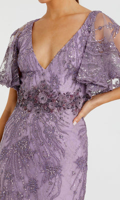 A woman wearing the Long Formal Dress 67493 by Mac Duggal, featuring a lavender hue, empire waist, beaded floral embroidery, flutter sleeves, and a deep V-neckline.