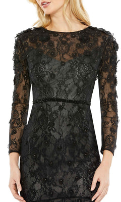 A woman stands with arms relaxed at her sides, wearing the Mac Duggal 67703 knee-length black party dress featuring long sleeves, lace fabric, and beaded details.