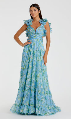 A woman in the Mac Duggal 67803 Ruffled Long Print Formal Dress, featuring a floral print, ruffled sleeves, and deep V-neck, stands against a plain background. The light blue A-line design creates an elegant silhouette.