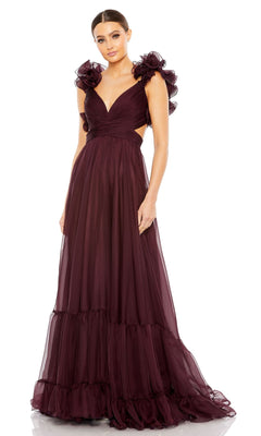 A woman models the Mac Duggal Empire-Waist Cut-Out Formal Dress 67911, a sleeveless, floor-length burgundy v-neck gown with ruffled shoulder accents, standing facing forward against a white background.