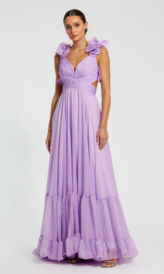 A woman wears the Mac Duggal Empire-Waist Cut-Out Formal Dress 67911, a long lavender gown with ruffled shoulders and a deep V-neck, standing against a plain white background.