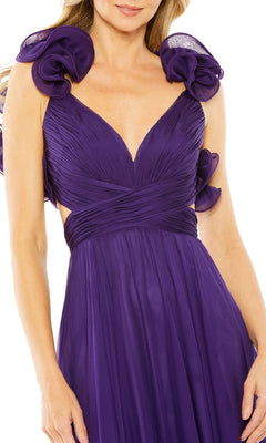 Woman wearing the Mac Duggal Empire-Waist Cut-Out Formal Dress 67911, a sleeveless deep purple gown with a pleated bodice, ruffled shoulder details, and a deep V-neckline.