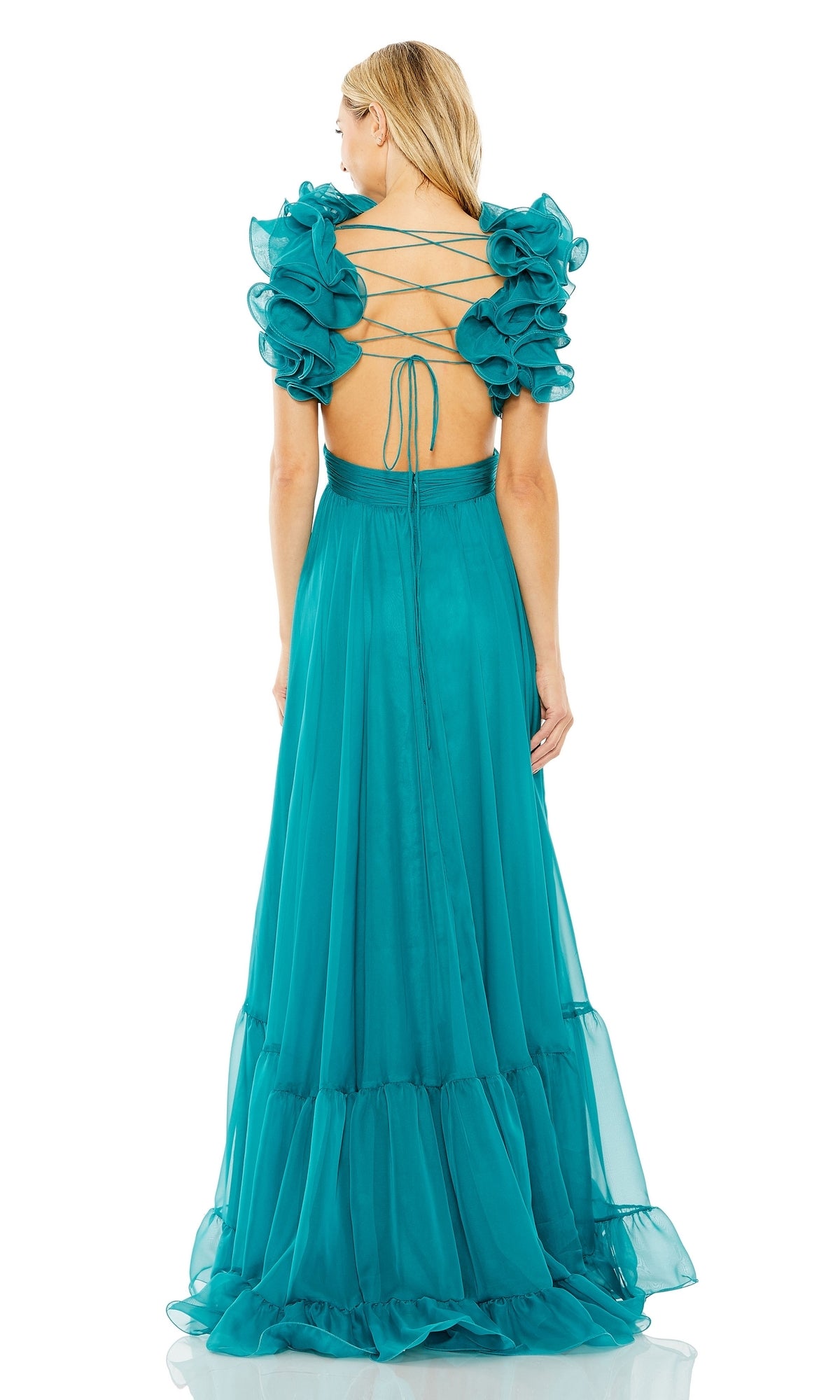 A woman models the Mac Duggal Empire-Waist Cut-Out Formal Dress 67911 in teal, featuring a floor-length skirt, ruffled short sleeves, and an open back with crisscross lace-up details, elegantly displayed from behind.