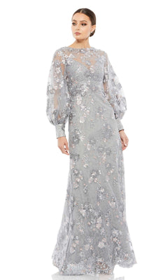 A woman wears the Long Formal Dress 67936 by Mac Duggal—a light blue floral lace gown with long sheer puff sleeves and a high neckline—standing against a white background.