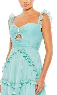 A woman wearing the Long Formal Dress 68093 by Mac Duggal, featuring a mint hue, ruffle accents, sweetheart neckline, and a small front cutout.
