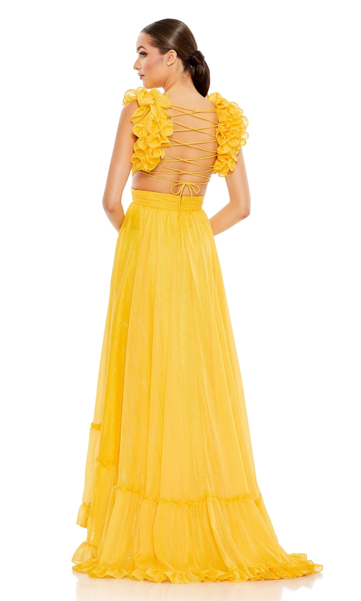 Woman in a yellow Lace-Up Ruffled Formal Gown: Mac Duggal 68094, featuring an open back, ruffled sleeves, and a floor-length skirt, stands facing away from the camera.