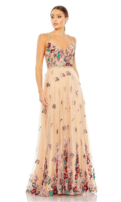 A woman stands against a white background wearing the Mac Duggal Embroidered Nude Formal Dress 681101, a sleeveless, floor-length gown featuring a sheer corset bodice and colorful floral embroidery.