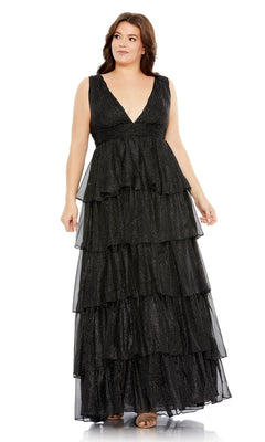 A woman wears the Long Plus-Size Formal Dress 68131 by Mac Duggal—a sleeveless, floor-length black layered ruffle dress with a deep V-neckline—standing against a white background.