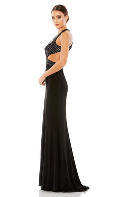 Woman standing sideways in the Mac Duggal Long Formal Dress 68166—a black sleeveless gown with beaded detail, v-neckline, side cutouts, and open back—posed against a plain white background.