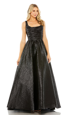 A woman models the Mac Duggal 68349 Long Glitter Prom Ball Gown, a sleeveless black floor-length dress with shiny textured fabric, standing against a white background and showcasing this elegant formal A-line style.