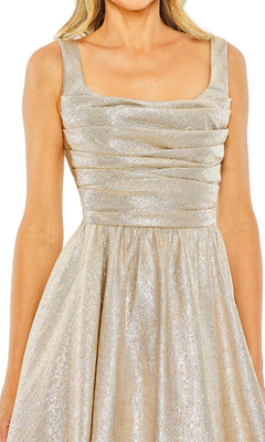 Woman wearing the Mac Duggal 68349 Long Glitter Prom Ball Gown, a sleeveless, metallic gold A-line dress featuring a square neckline and ruched bodice, exuding signature Mac Duggal elegance.