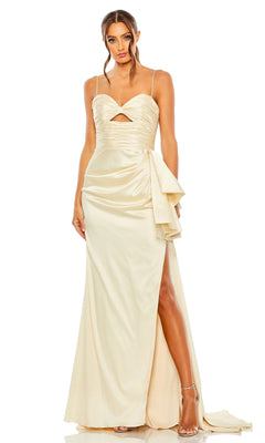 A woman wears the Long Formal Dress 68450 by Mac Duggal, a cream satin gown with a ruched sweetheart bodice, spaghetti straps, front cutout, side slit, and draped waist detail, standing against a white background.