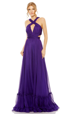 A woman in the Long Formal Dress 68474 by Mac Duggal, featuring a floor-length, sleeveless purple design with a crisscross halter neckline, waist cutouts, and an open back, stands against a white background.