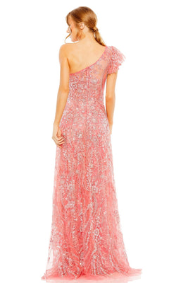 A woman in the Long Formal Dress 68512 by Mac Duggal, featuring a coral pink, one-shoulder design with sequins and lace detailing, stands with her back to the camera, highlighting the elegant silhouette of this embellished gown.