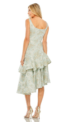 A woman wearing the Mac Duggal 68613 French Blue Wedding Guest Dress—a sleeveless, ruffled midi with a layered skirt—paired with metallic high heels, seen from the back.