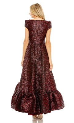 A woman faces away wearing the Mac Duggal Long Formal Dress 68623, a textured dark red brocade gown with short sleeves, a ruffled hem, and a visible back zipper.