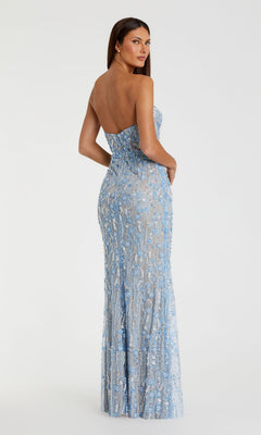 Model wearing the Mac Duggal 68893 Long Formal Dress, a strapless, floor-length fitted blue gown featuring sequin embellishments and delicate floral beadwork, posed standing and looking over her shoulder against a plain white background.