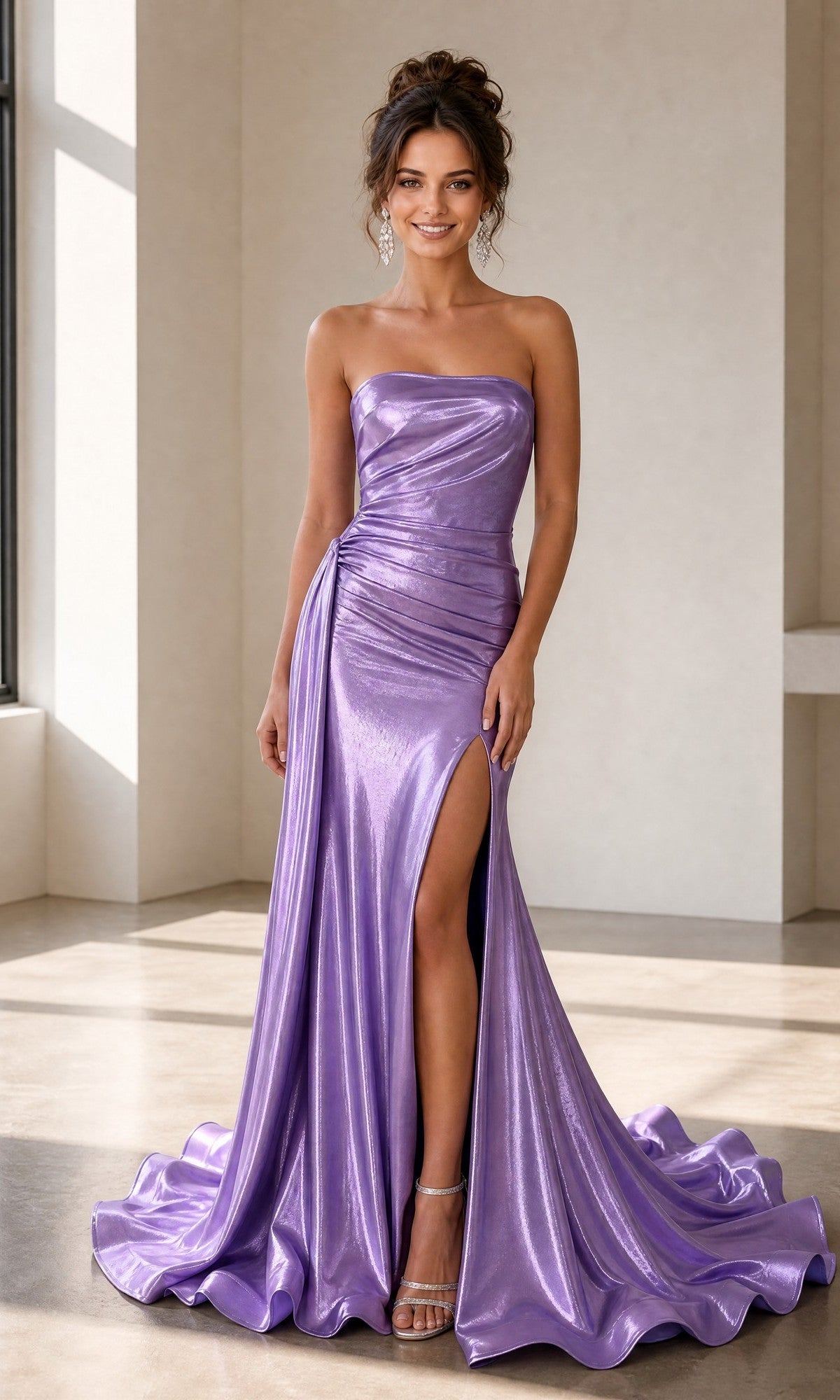 A woman wearing the Long Prom Dress: Atria 6927HF in Lilac Foil—a strapless gown featuring a thigh-high slit—stands indoors on a polished floor.
