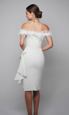 A woman wearing the Alyce 70000 knee-length semi-formal dress with off-the-shoulder style, feather trim, and a side ruffle stands against a plain gray background, her back facing the camera.