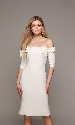 A woman poses against a plain background wearing the Alyce 70003 knee-length semi-formal dress in ivory, featuring off-the-shoulder three-quarter sleeves with delicate 3D floral appliques.