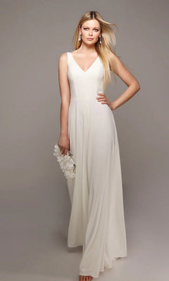 A woman in the Alyce 70021 long white jumpsuit with wide-leg pants holds a white floral clutch, posing against a plain gray background.